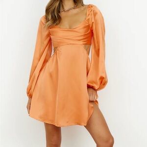 Hello Molly Dress, Orange, and Xs in size. It comes with bra pads.